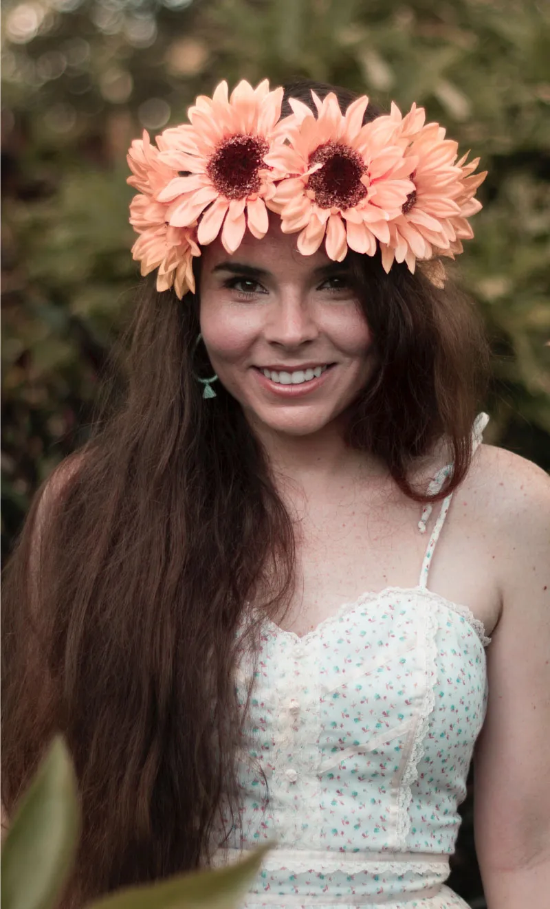 Brunette woman with a bright orange flower crown