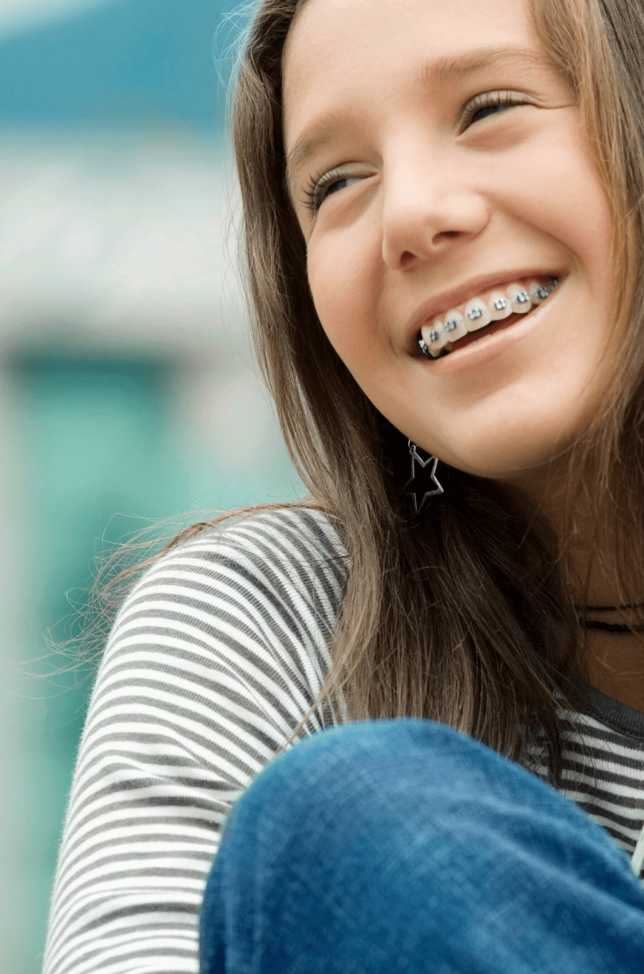 little girl with ceramic braces